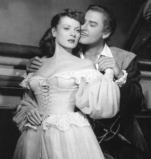 Brian Hawke (Flynn) woos ladypirate Spitfire (O'Hara)