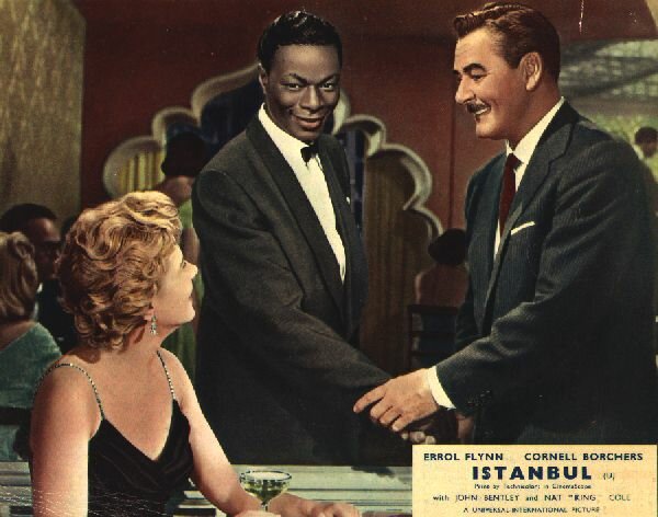Colour lobbycard: Cornel Borchers & Errol Flynn as lovers Stephanie & Jim, with<br>Nat King Cole looking on - 54kb
