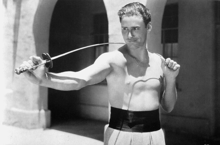 A young Errol Flynn training for Captain Blood in 1935