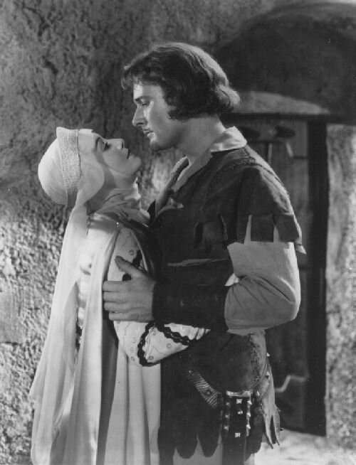 Errol Flynn & Olivia de Havilland as Robin and Marian